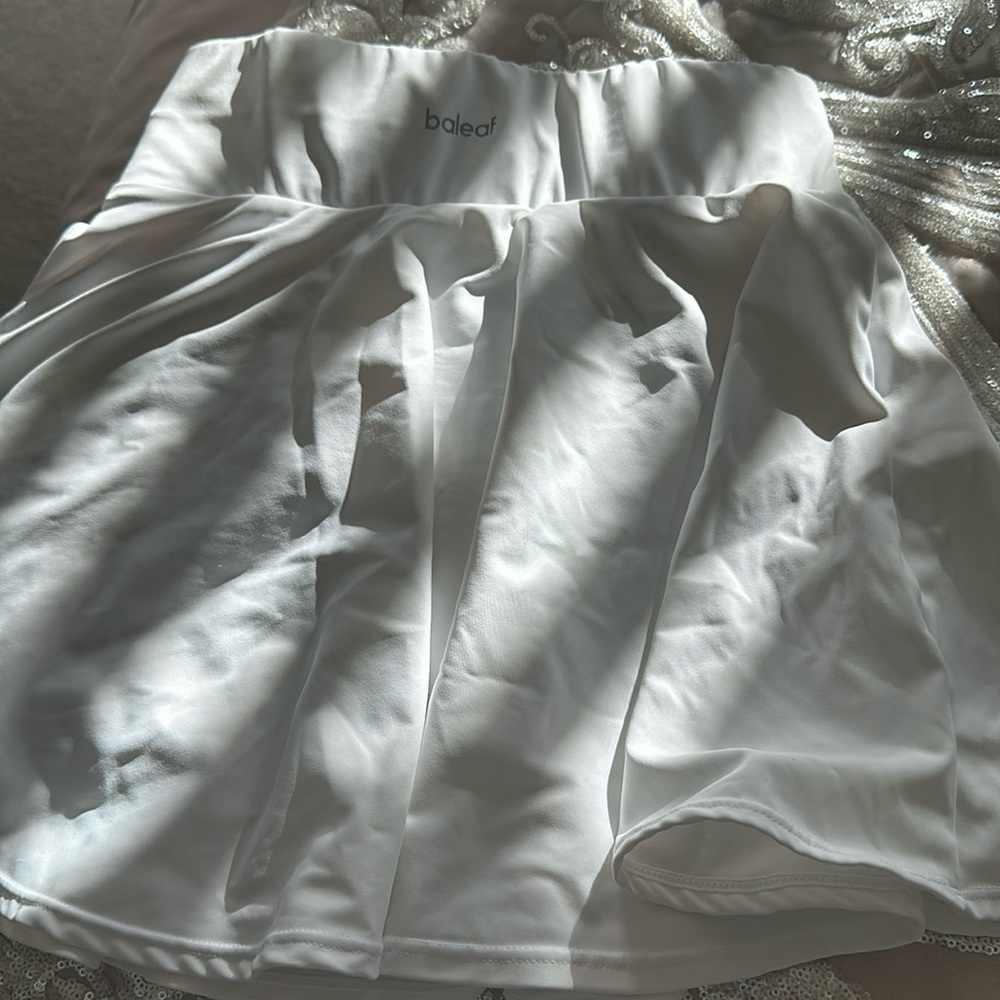 White tennis shirt wore once